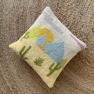 Cute little cactus pillow.